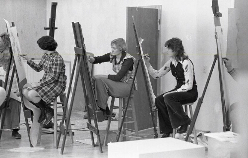 Portrait of students working on art