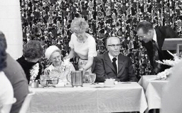 Ezra Taft Benson at a banquet with his wife