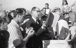Pres. Henry B. Eyring reading a newspaper
